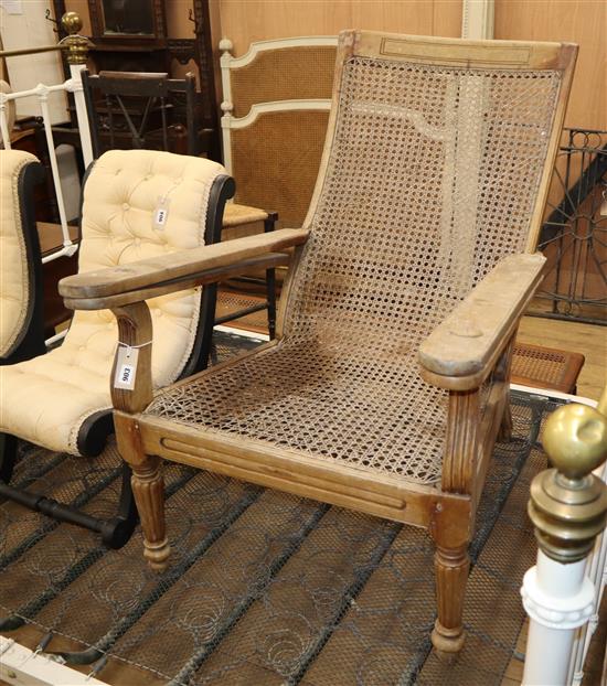 A caned hardwood plantation chair